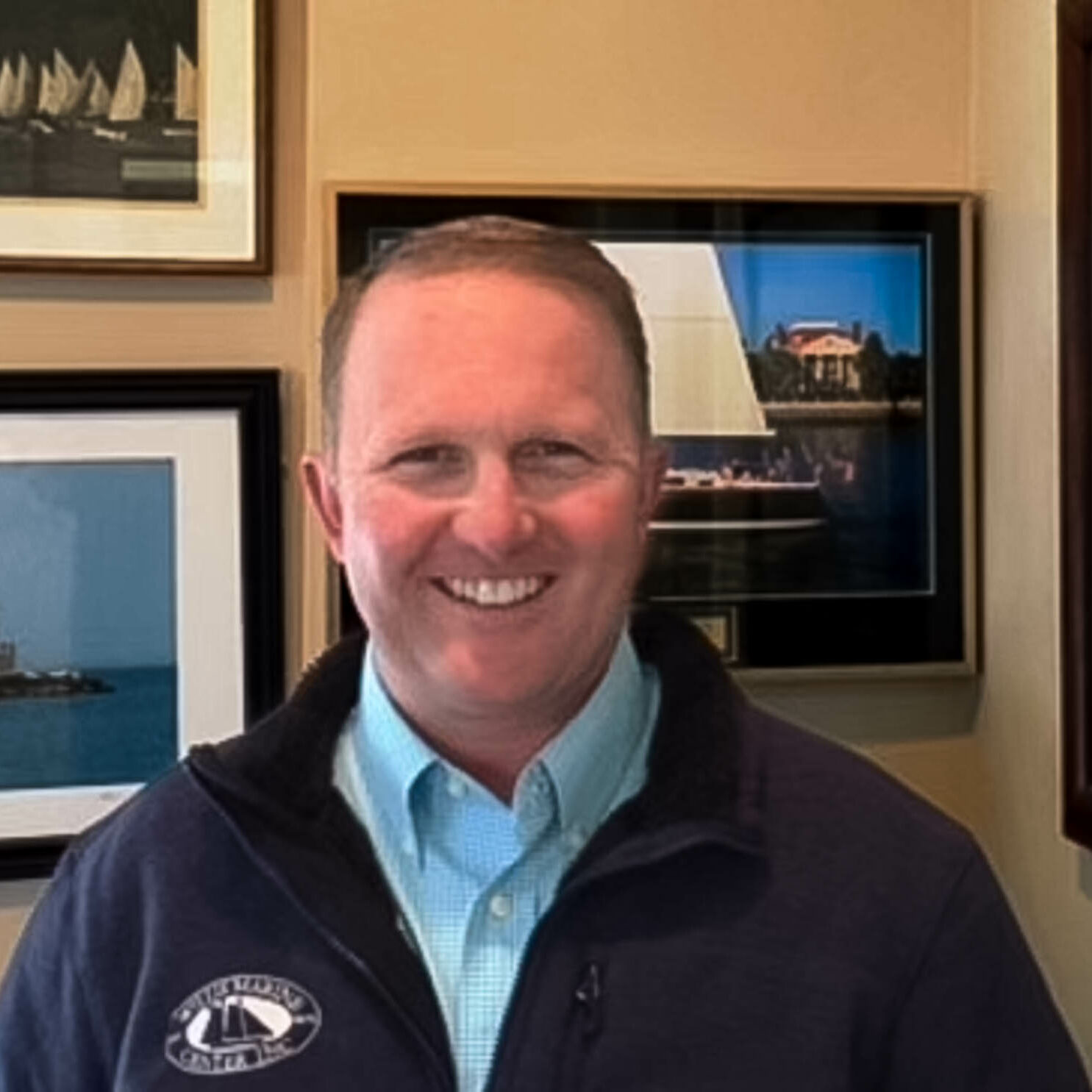 David Willis, Certified Professional Yacht Broker – East Coast Yacht Sales Headshot of David Willis, Certified Professional Yacht Broker at the Huntington, NY office, standing in a room with nautical-themed pictures behind him.