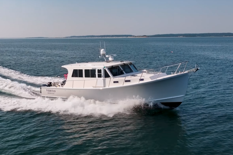 2016 Wesmac 42 – Starboard Bow Cruising View Starboard bow view of a 2016 Wesmac 42 cruising, with ocean and sky visible.