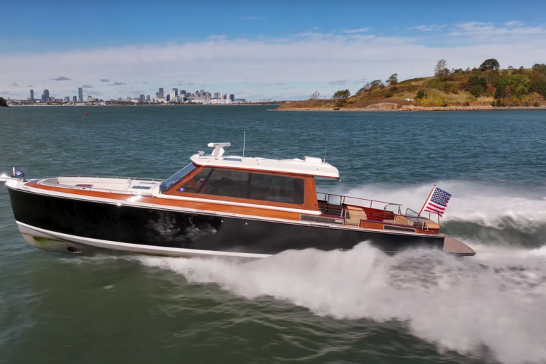 Boston Boat Works 48’ Daychaser Cruising – Boston Skyline Boston Boat Works 48’ Daychaser cruising at speed with the Boston skyline visible in the distance.