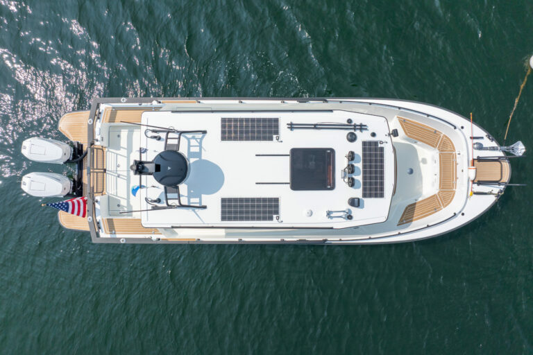 Targa 32 Outboard Aerial View in Casco Bay – East Coast Yacht Sales Top-down aerial view of a Targa 32 Outboard floating in Casco Bay, Maine.