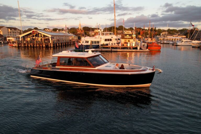 Boston Boatworks 48’ Daychaser in Harbor – East Coast Yacht Sales 2024 Boston Boatworks 48’ Daychaser slowly cruising through a harbor at golden hour.