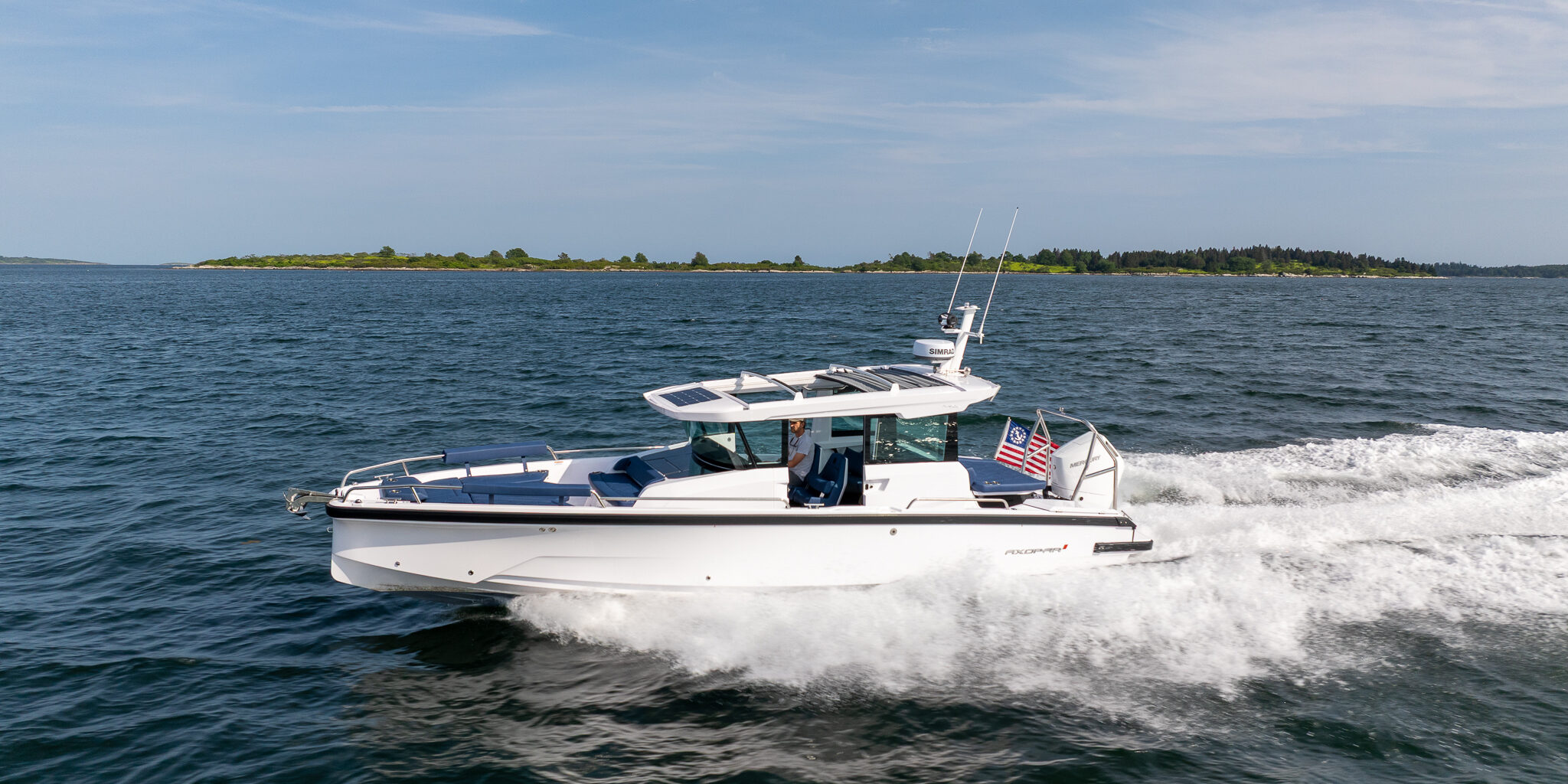 Axopar 29 XC Cross Cabin in Casco Bay – East Coast Yacht Sales Axopar 29 XC Cross Cabin cruising in Casco Bay, Maine, photographed by East Coast Yacht Sales.