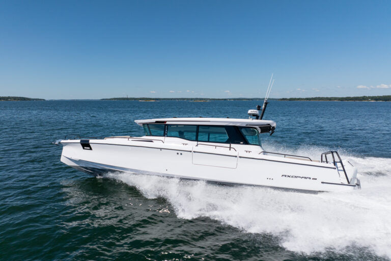 Axopar 45 BRABUS Edition Stock 2 Running Shot in Casco Bay, Maine Axopar 45 BRABUS Edition Cruising through Casco Bay, Maine on a sunny day