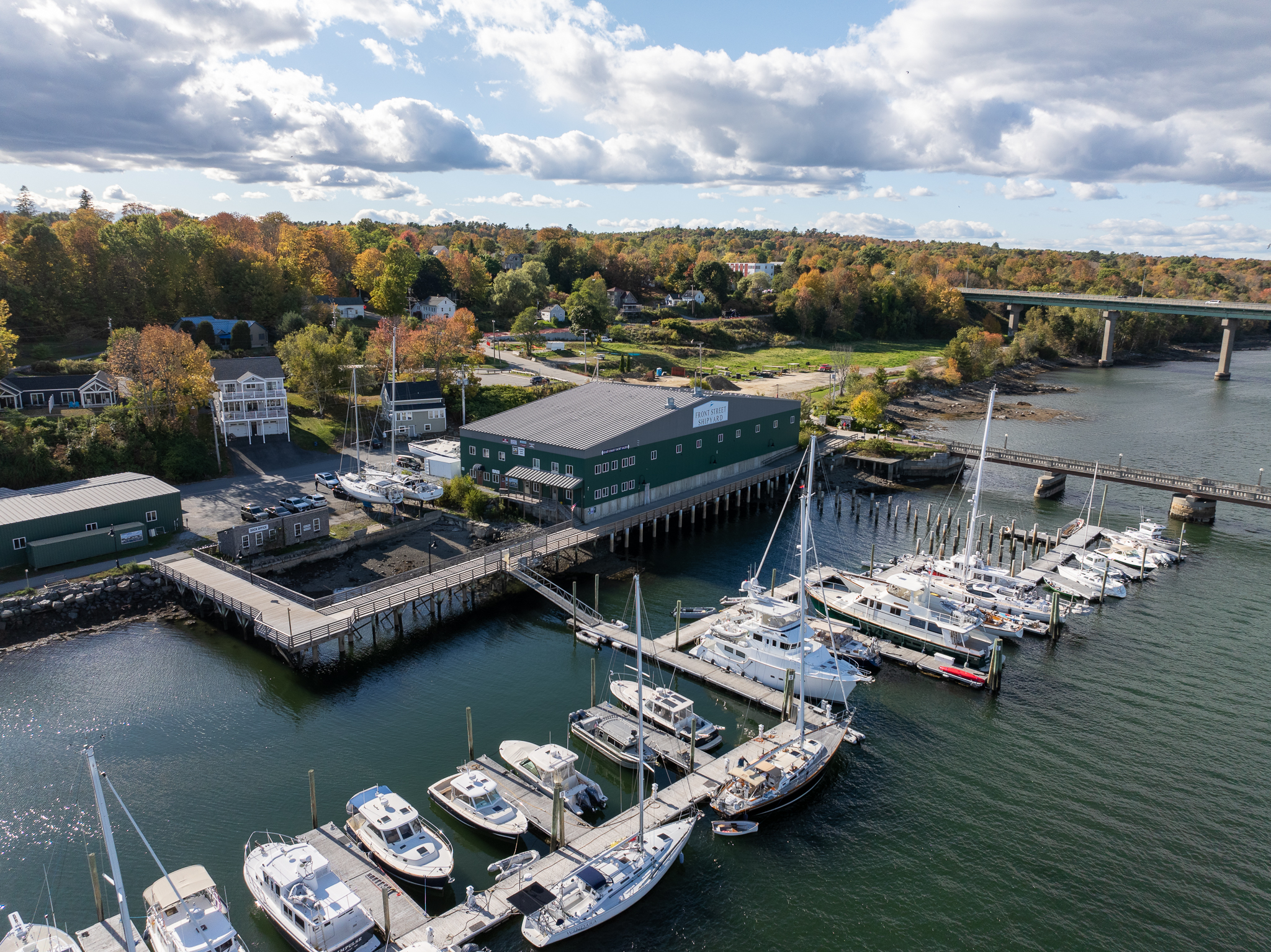 East Coast Yacht Sales Belfast Maine Waterfront Office Aerial view of East Coast Yacht Sales’ Belfast, Maine office with boats docked along the waterfront
